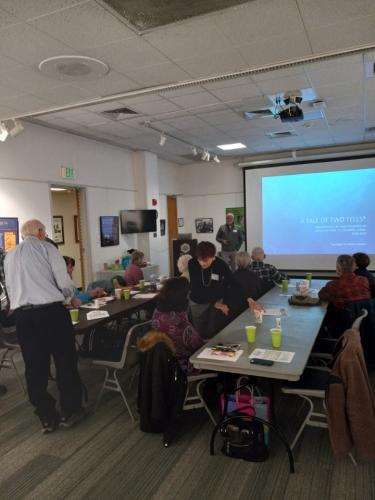 Finishing dinner and listening to Dr. Tucker