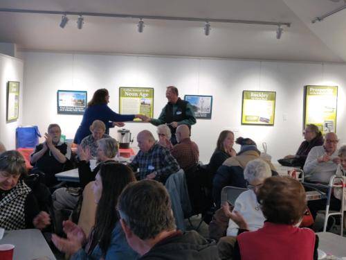 members enjoying the potluck